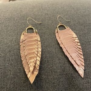 Gold leather flared earrings